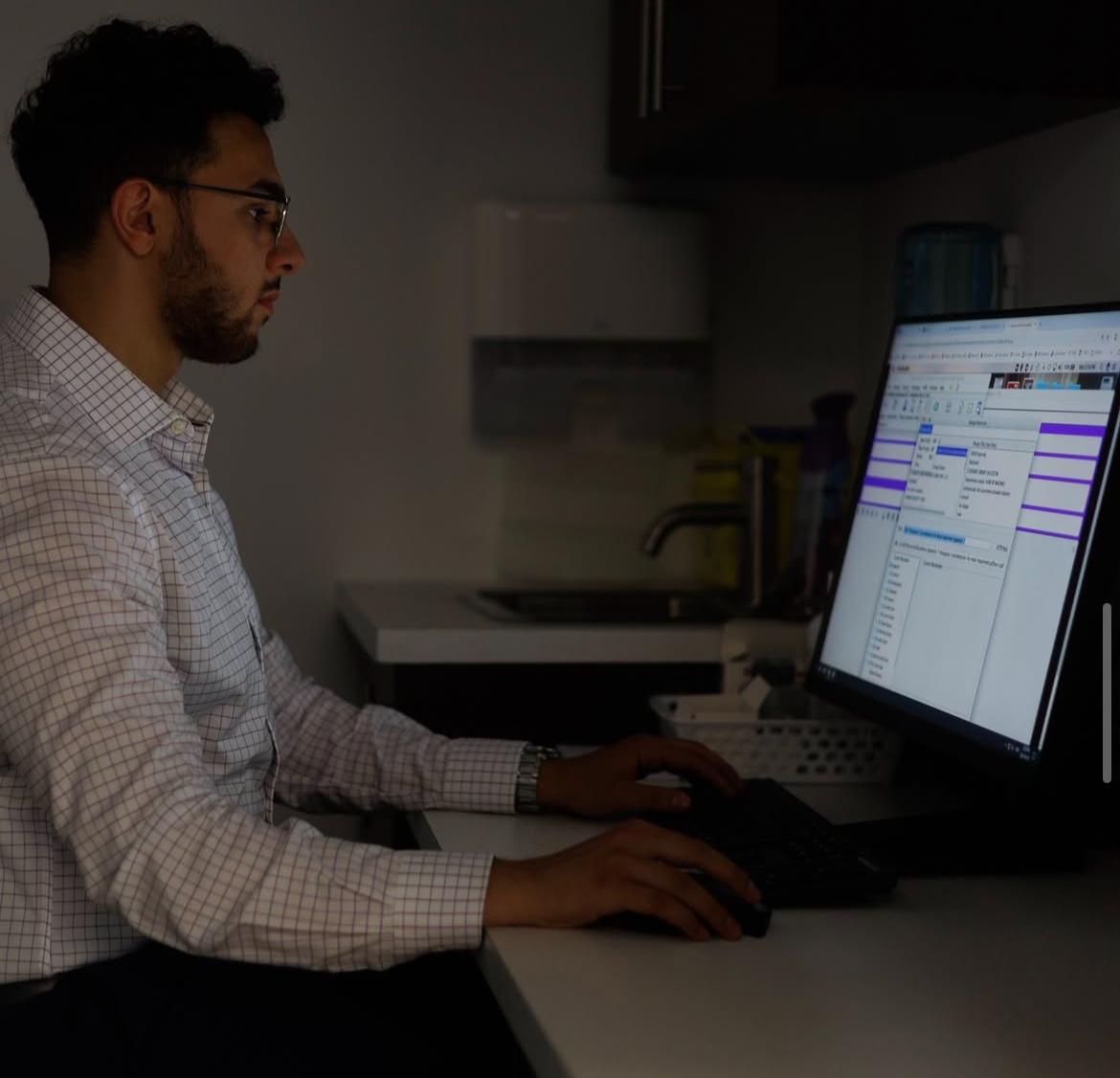 Doctor working at computer